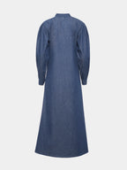 Back view of blue denim abaya showing its long, gently flared silhouette