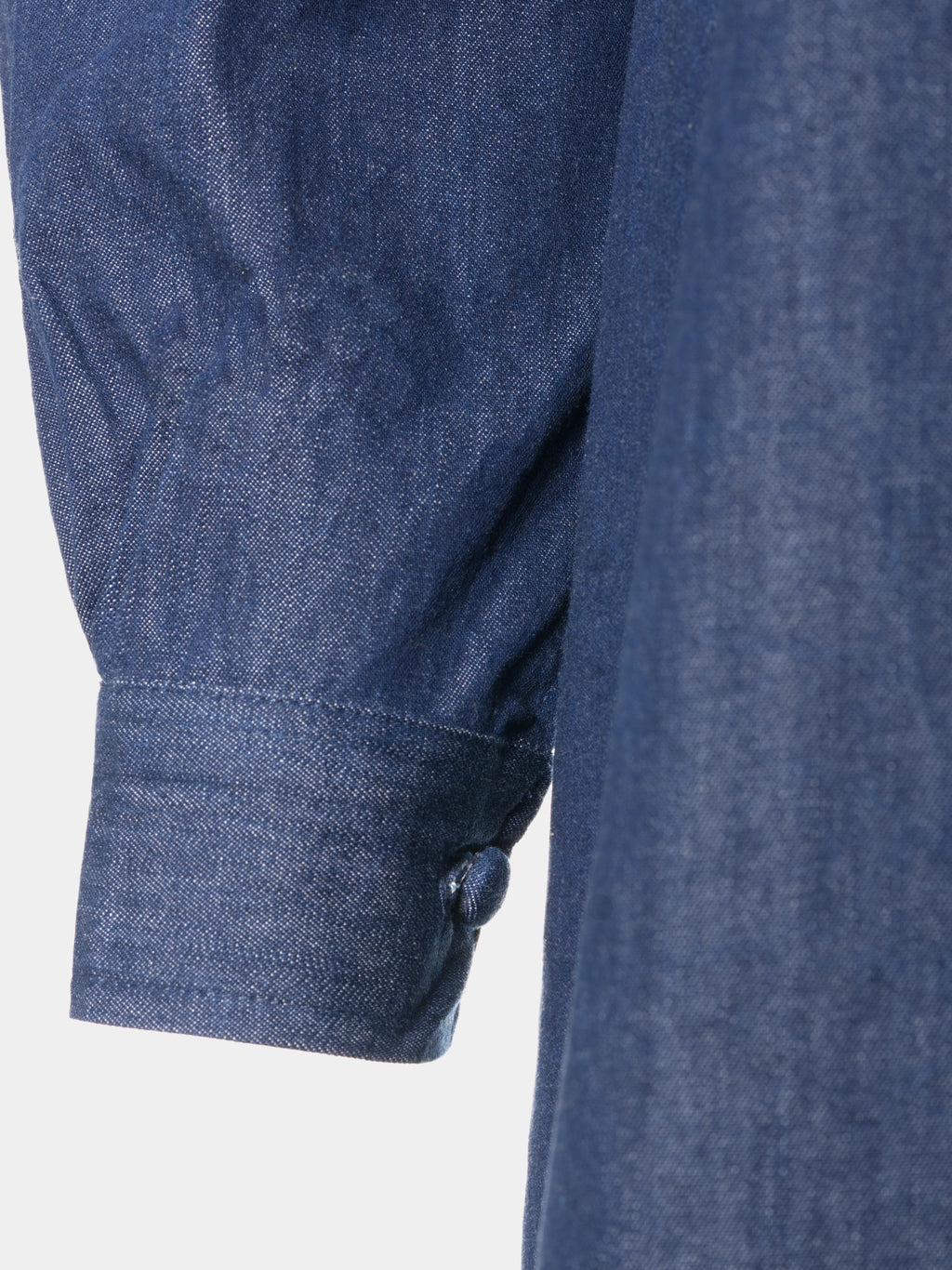 Gathered sleeve and fabric-covered cuff button on blue denim abaya