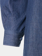 Gathered sleeve and fabric-covered cuff button on blue denim abaya