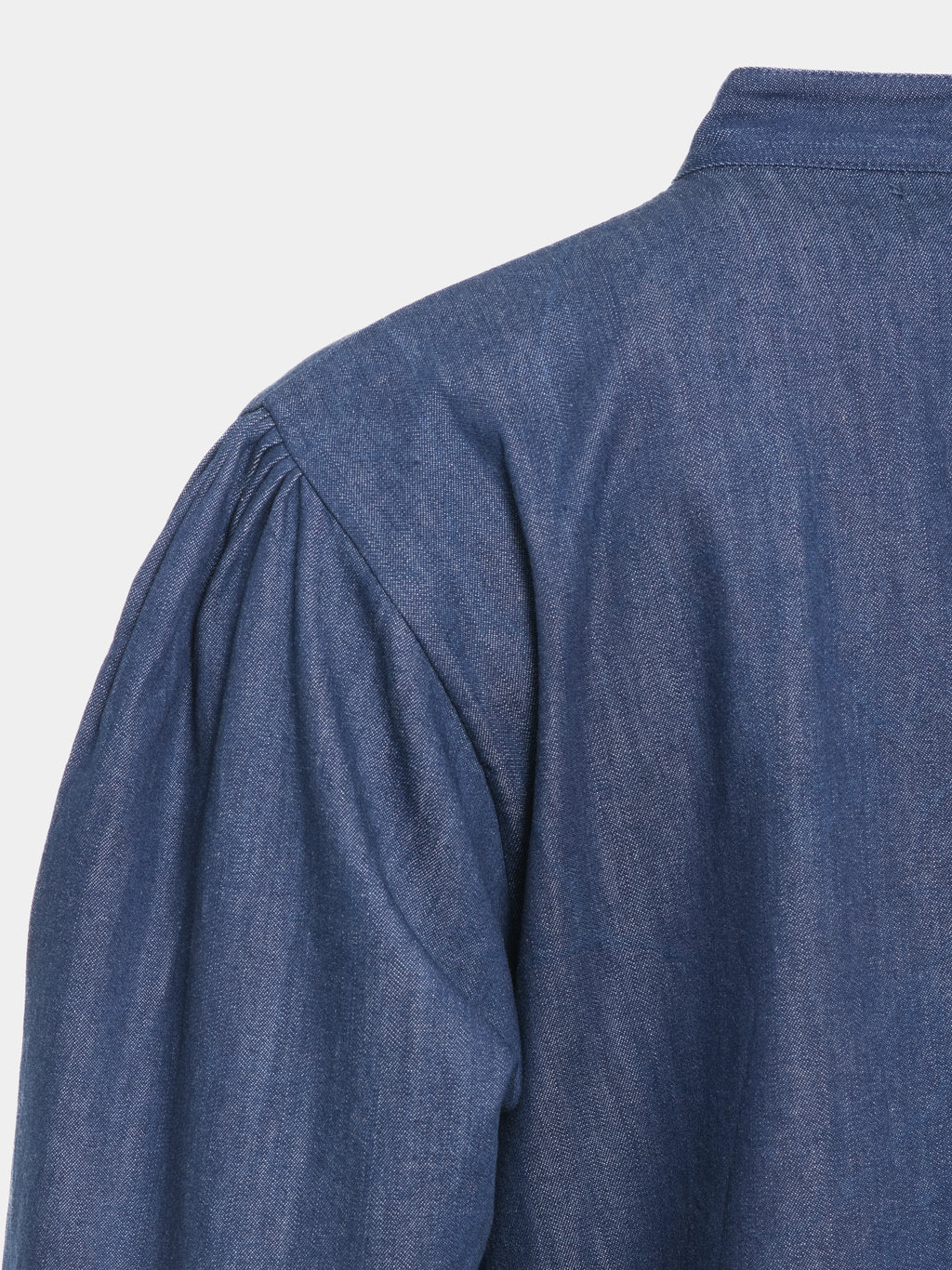 Gathered shoulder detail and denim texture on blue abaya