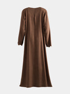 Brown dress on a white background