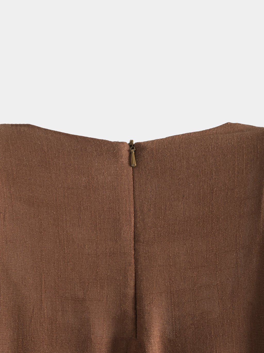 Brown fabric with a zipper detail on a white background