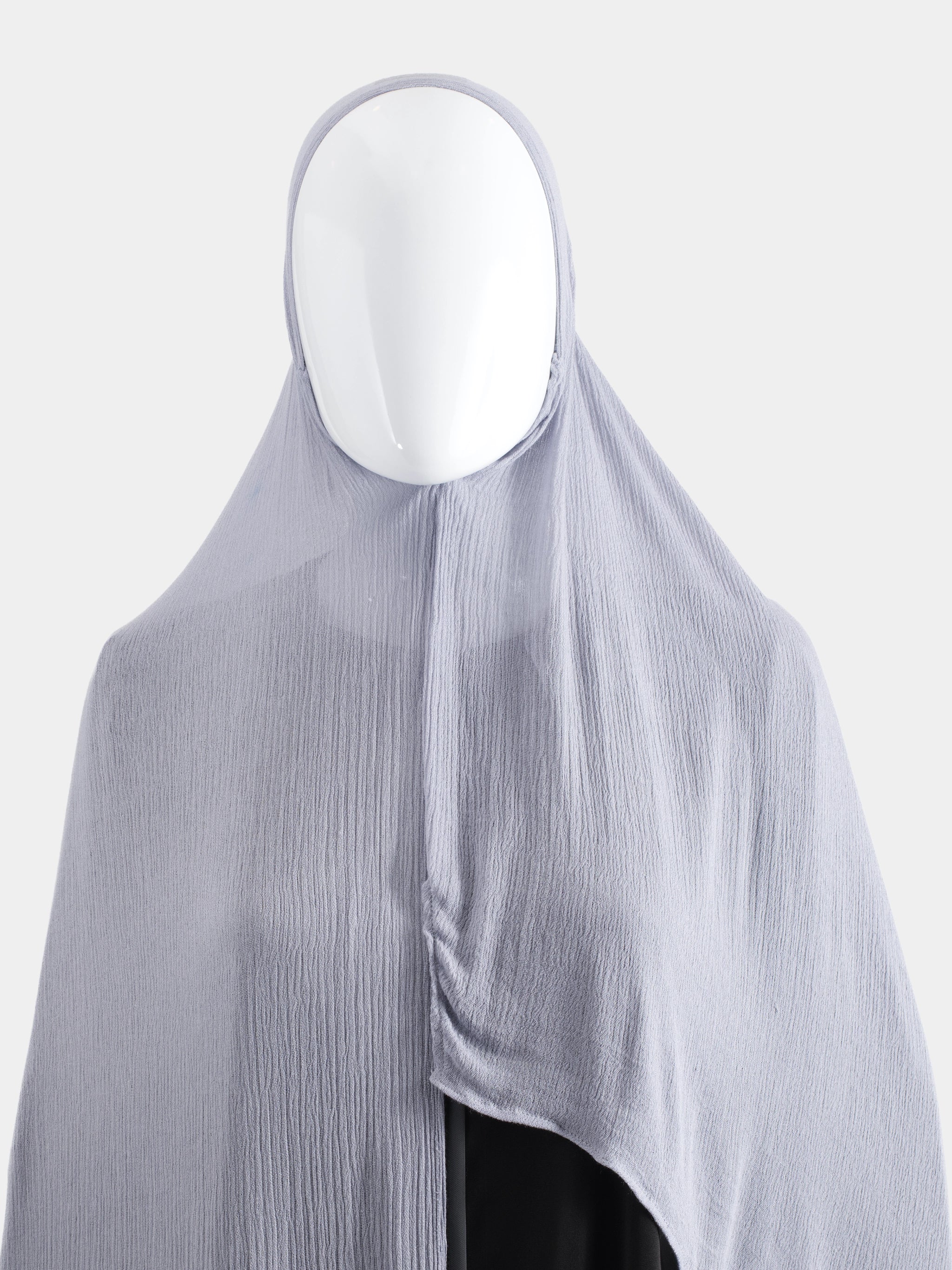 Flat view of the Lavender Instant Modal Cotton Hijab on a mannequin showing the pre-stitched front construction and textured knit.