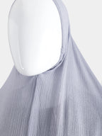 Close-up of the elasticated face-opening on the Lavender Instant Hijab, showing the flexible seam and modal cotton grain.