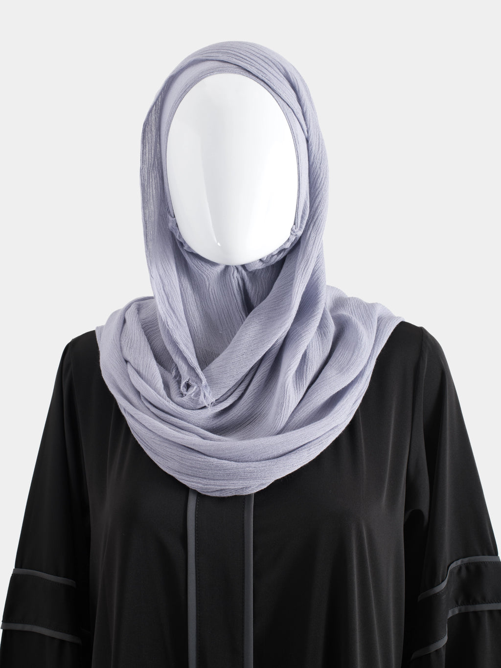 Lavender Instant Modal Cotton Hijab styled with a wrapped chest drape to demonstrate the pin-free, hand-wrapped aesthetic.