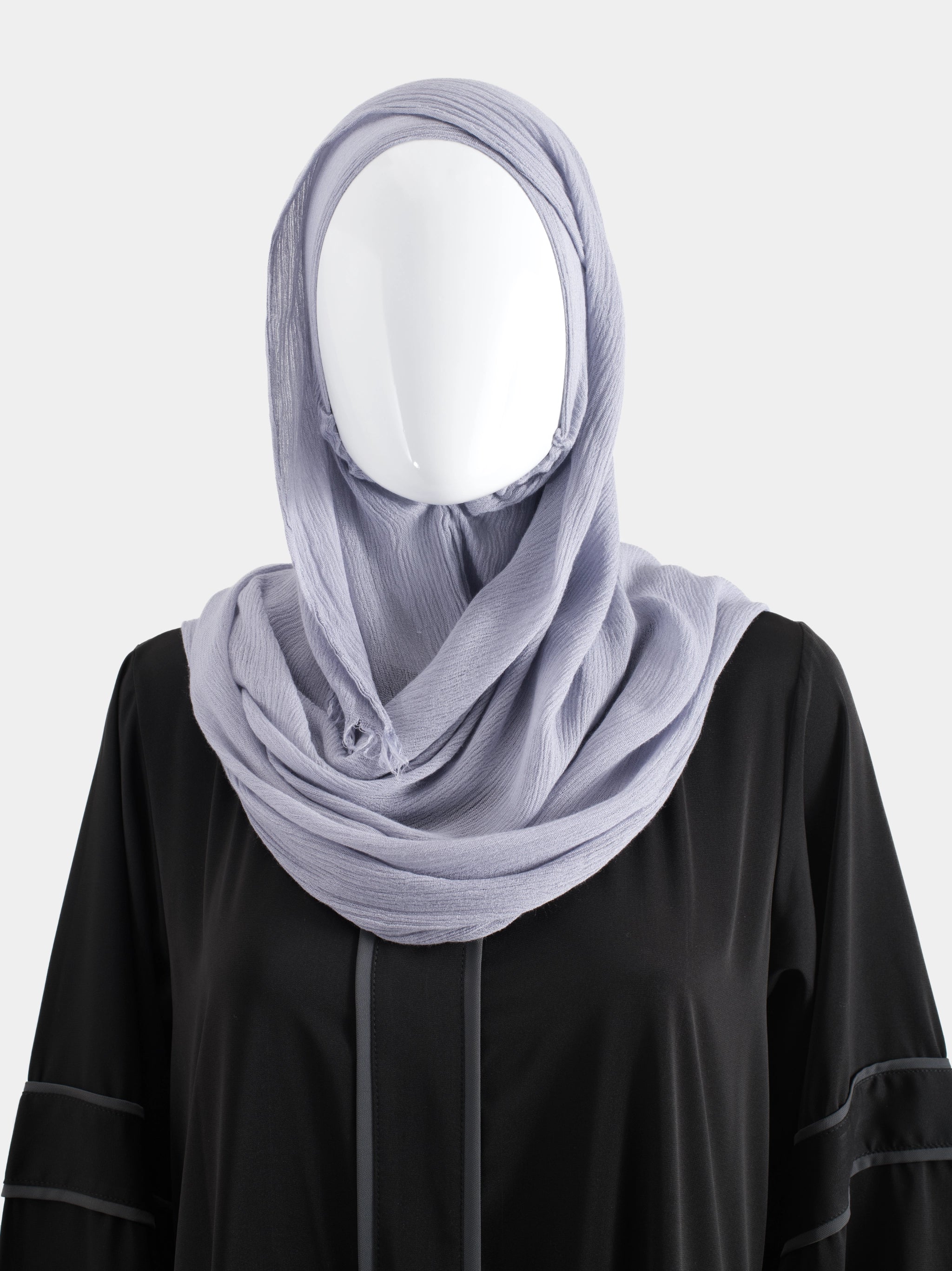Lavender Instant Modal Cotton Hijab styled with a wrapped chest drape to demonstrate the pin-free, hand-wrapped aesthetic.