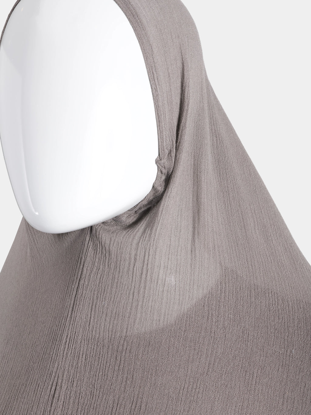 Close-up detail of the elasticated face-frame on the Taupe Instant Hijab, highlighting the high-friction modal cotton texture.