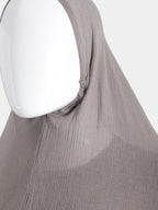 Close-up detail of the elasticated face-frame on the Taupe Instant Hijab, highlighting the high-friction modal cotton texture.