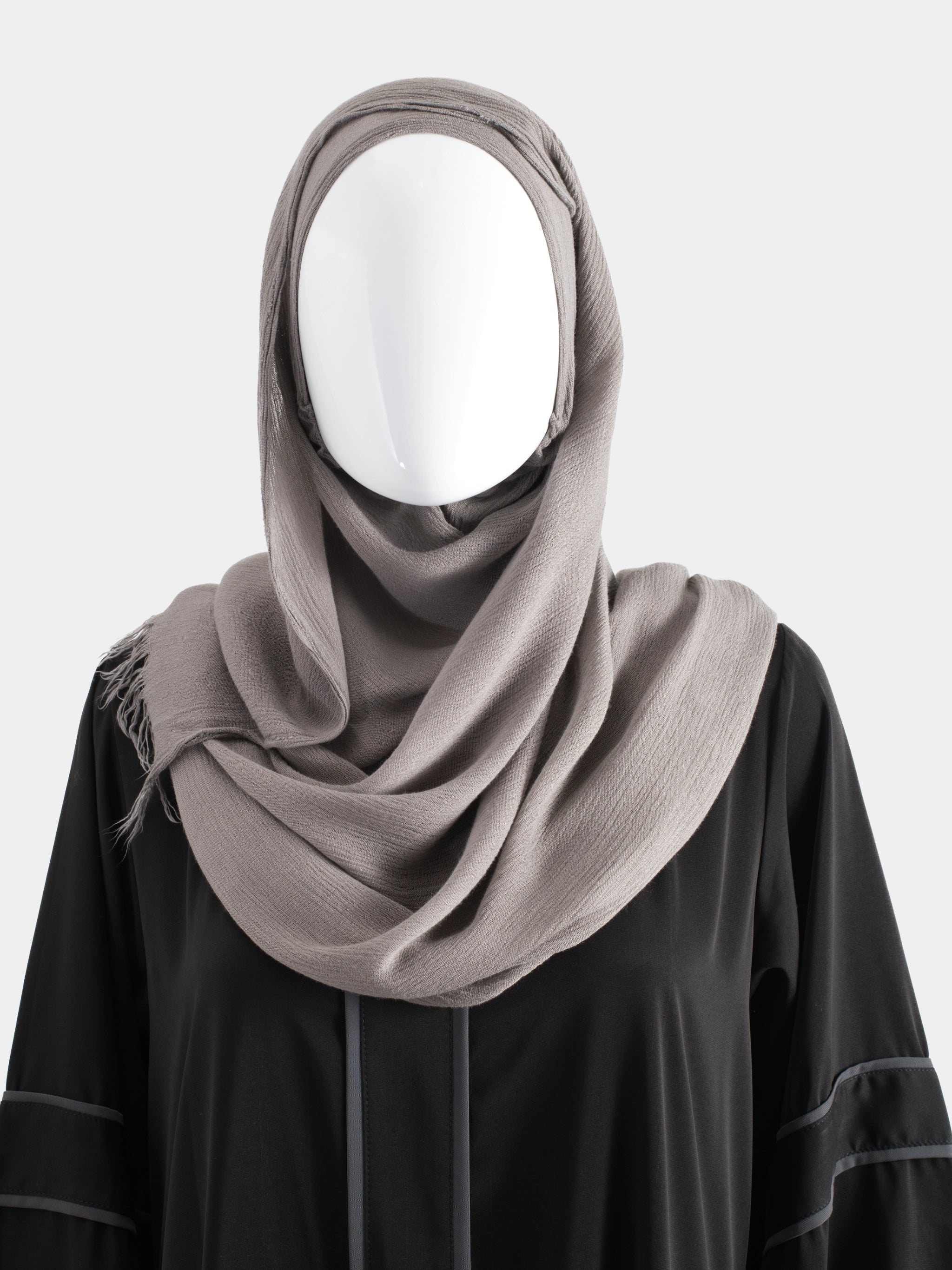 Instant Modal Cotton Hijab in Taupe styled as a hand-wrapped drape on a mannequin to show opaque coverage and fabric weight.