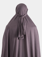 Purple jilbab with a tie-back on a white background