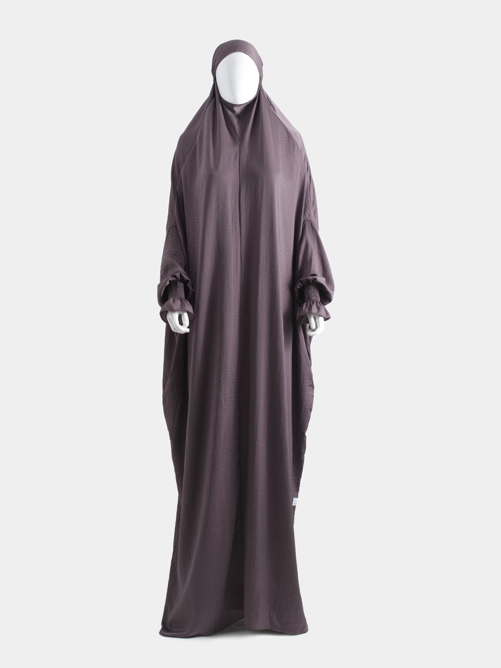 Purple jilbab on a white background