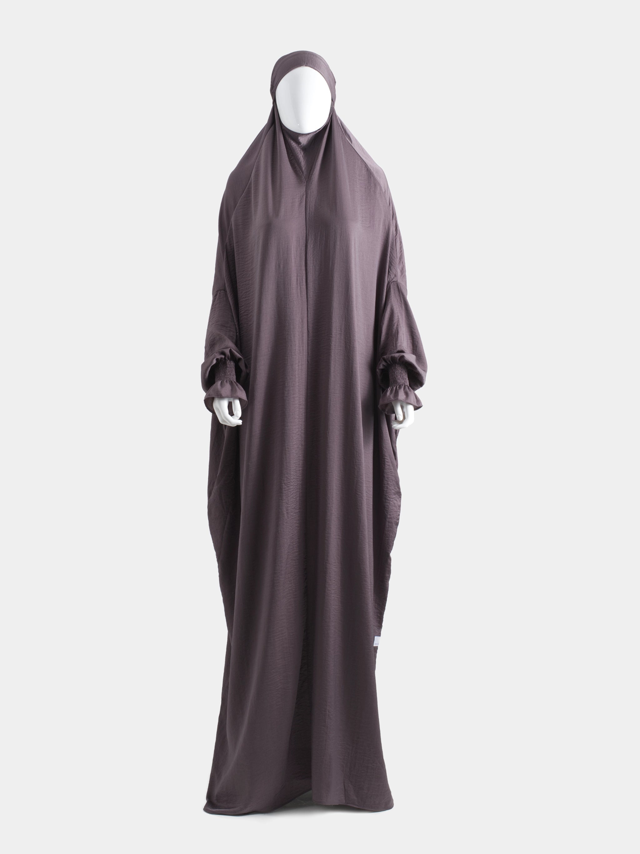 Purple jilbab on a white background