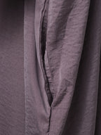 Close-up of a purple jilbab pocket