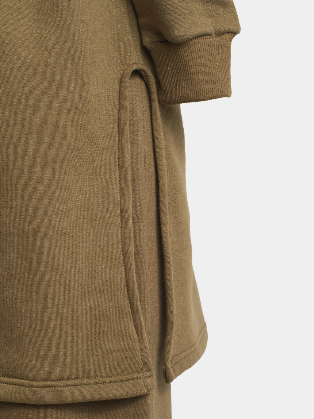 Close‑up of taupe cotton fleece side slit on longline lounge top