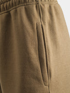 Close‑up of taupe cotton fleece lounge pants side pocket
