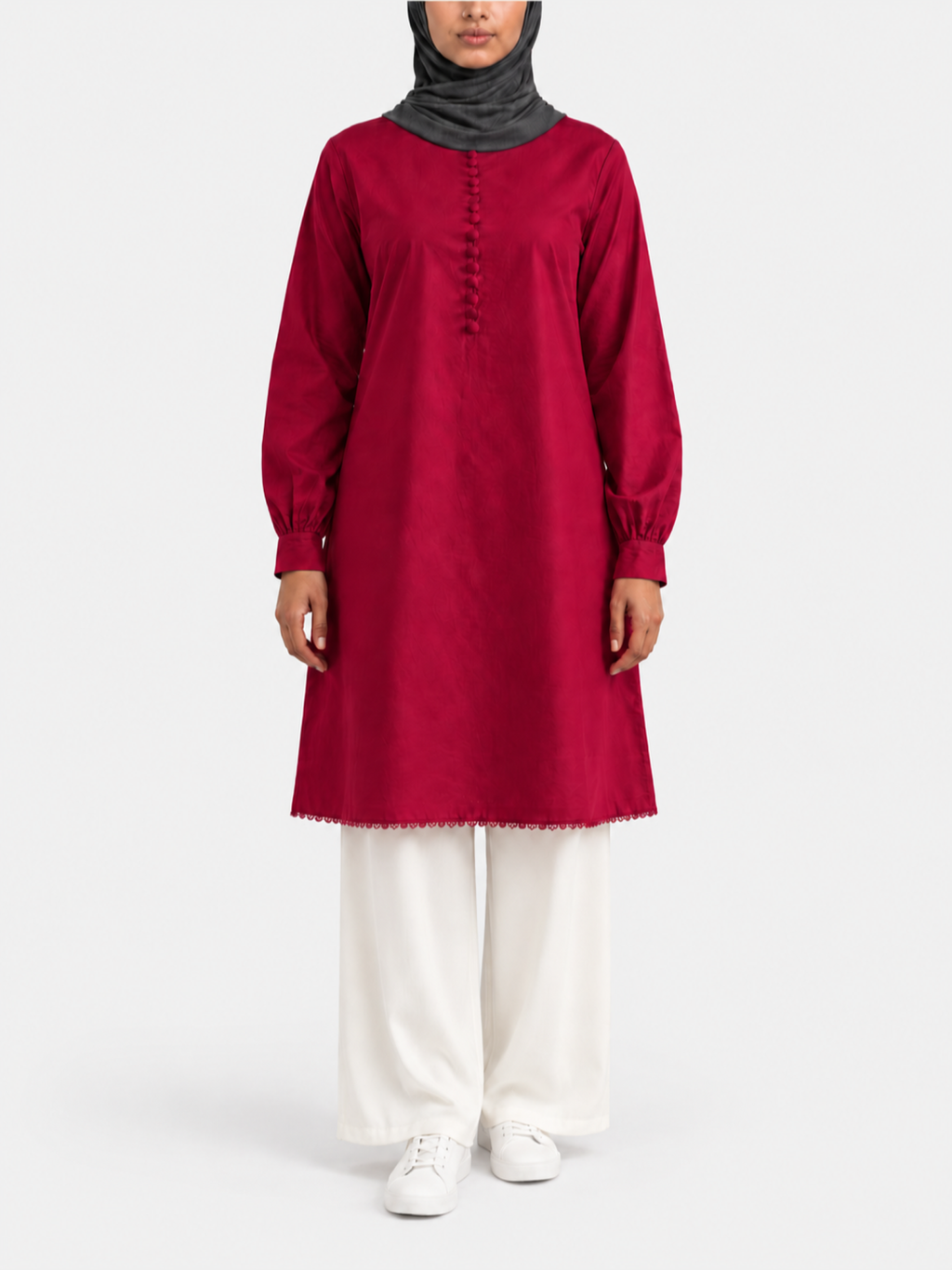 Front view of Crimson Red cotton long tunic with covered buttons and decorative hem, styled with ivory palazzo pants.