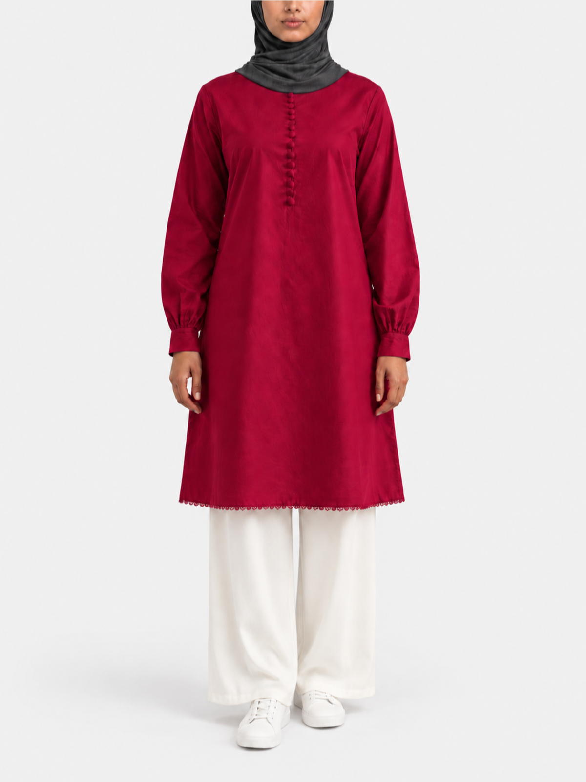 Front view of Crimson Red cotton long tunic with covered buttons and decorative hem, styled with ivory palazzo pants.